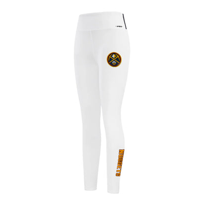 Front left view of a pair of white, high-waisted leggings featuring the Denver Nuggets Primary logo on the upper left hip, Nuggets wordmark facing down on the left ankle.  Navy strip on the left side of waist, with a black rubber Pro Standard Logo to the left of stripes.
