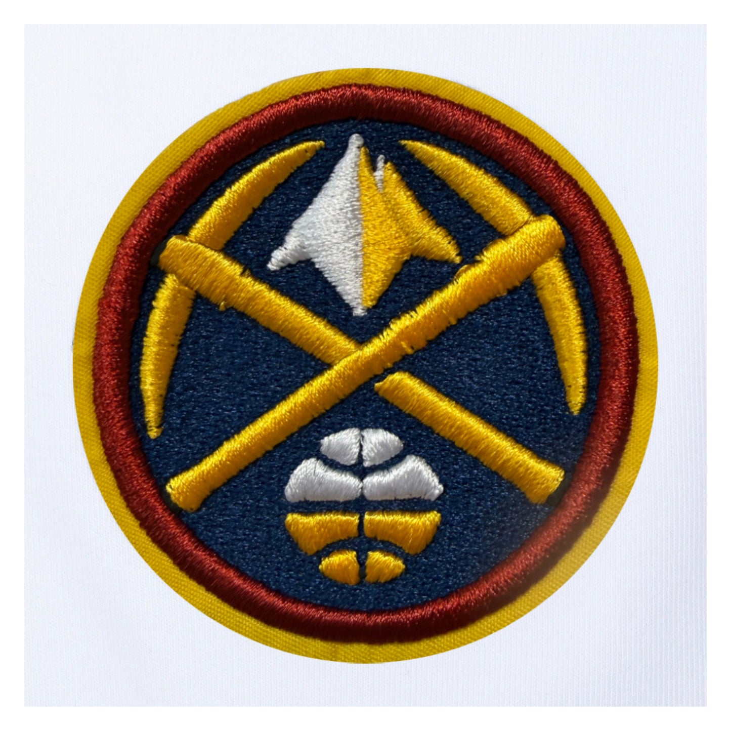 Up close view of the Nuggets Primary logo embroidered patch