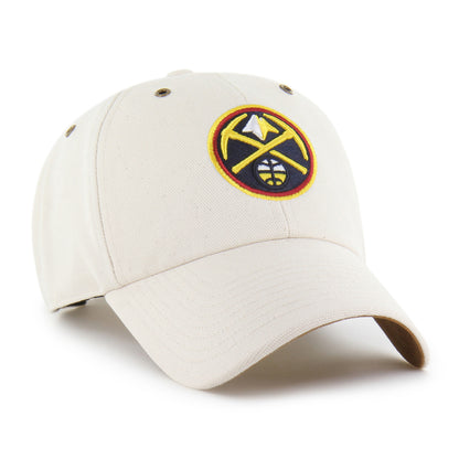 Front left view of a structured hat with an off-white crown and brim, and a circular primary Nuggets logo on the front featuring crossed gold picks and a mountain