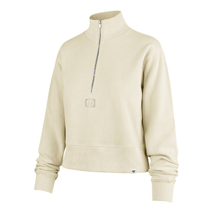 Front left view of a cream colored cropped pullover.  Half zip with a small tonal patch of a tonal Nuggets primary logo below the end of the zipper.